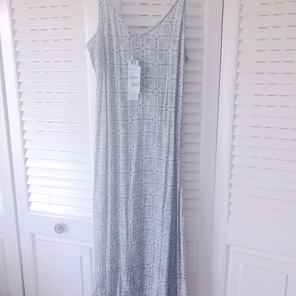 Maxi lite weight dress. Slits on each side. NWT sz large. O Neil is design